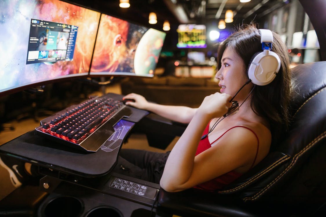 Free A Woman Playing Video Game Stock Photo